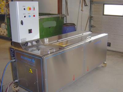 Machine ACCUSTRIP pour nettoyage des rouleaux.